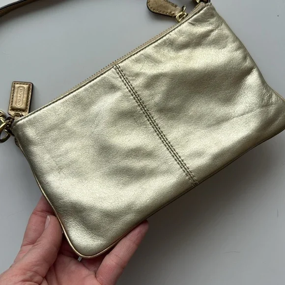 Gold metallic Coach legacy Zippy leather wristlet/baguette Clutch